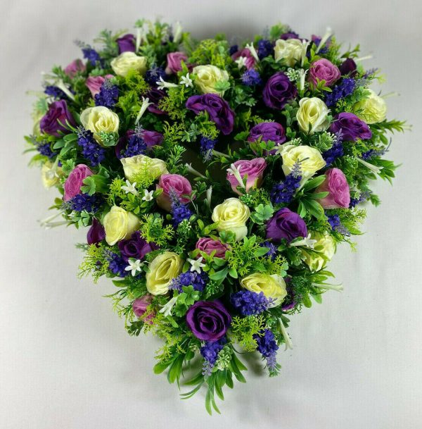Large purple open heart artificial flower grave wreath
