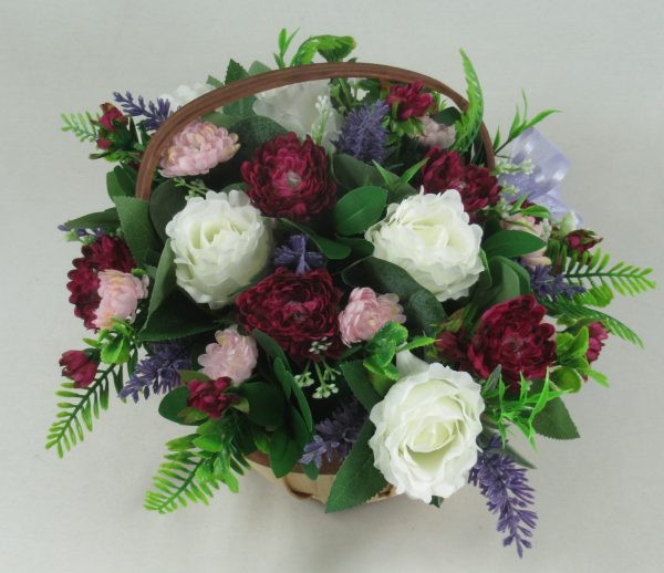 artificial basket trug arrangement in purple and white