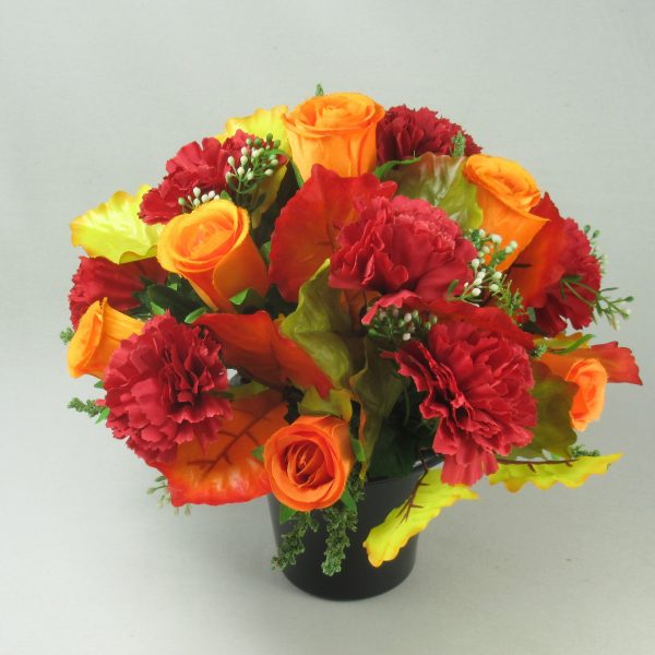 Grave flower arrangement with red large carnations and orange rose buds. - Image 4